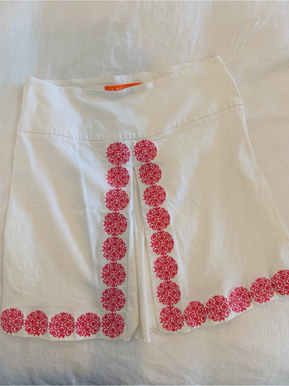 White Women's Embroidered Split-Front Skort with Pink Motif